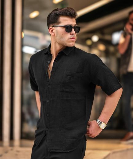 У oversized рубашка из муслина с одним карманом черного цвета обеспечит термокомфорт и стильный образ в повседневной носке